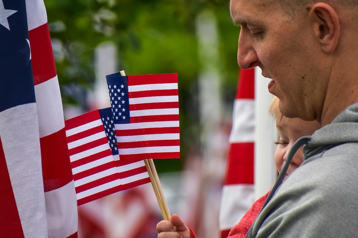 A team of professionals reviewing campaign applications at a desk